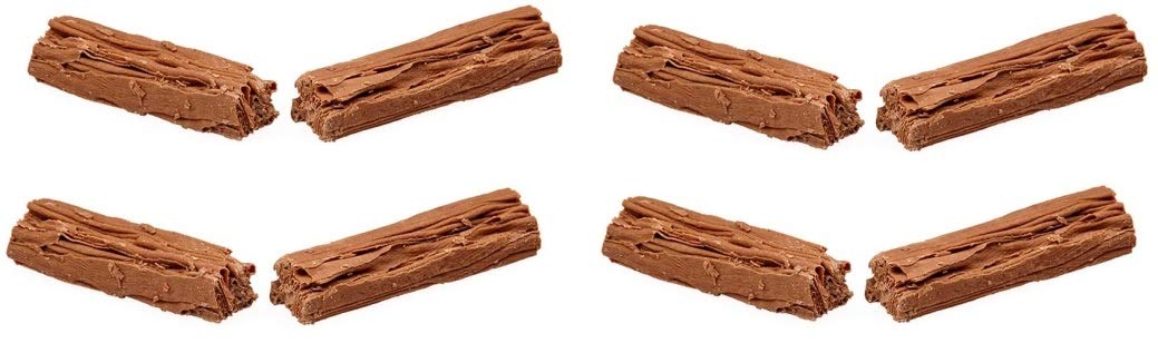 Cadbury Flake milk chocolate close-up shows smooth texture and flakes.