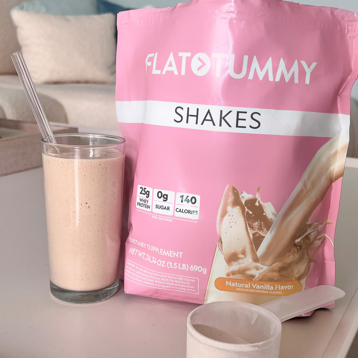 Flat Tummy Shakes Vanilla glass shows smooth, delicious texture.