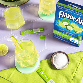 Flavor Aid Singles To Go cucumber lime glass shows refreshing flavor in water