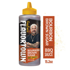 Bottle being poured of Flavortown sauce to glaze meats