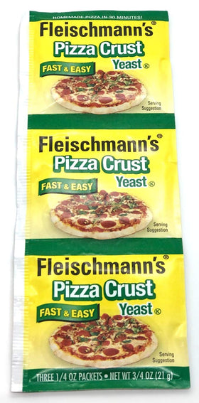 Dough being kneaded on a floured surface with Fleischmann's yeast.