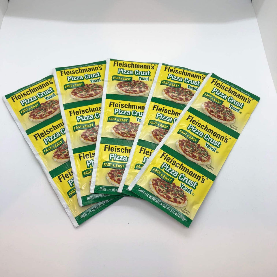 Fleischmann's Yeast Pizza pouch in a bowl, ready to mix for easy crust.