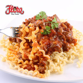 Flora Fine Foods raw fusilli lunghi shows golden organic durum wheat strands.