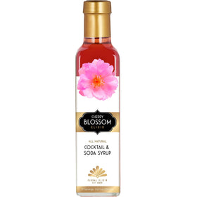 Floral Elixir Co. Cherry Blossom Elixir bottle front showing elegant packaging for premium cocktails