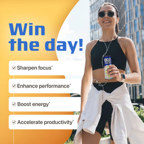 Pouring Focus Factor orange energy drink into a glass
