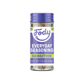 Fody Everyday Seasoning on a kitchen counter adds onion- and garlic-free flavor to meals.