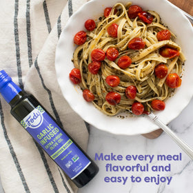 Fody Garlic Infused Olive Oil glass jar back label shows vegan, gluten-free attributes