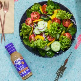 Fody Maple Dijon on greens plate, vibrant and zesty