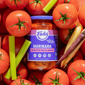 Fody sauce label displays gluten-free and vegan badges visible.
