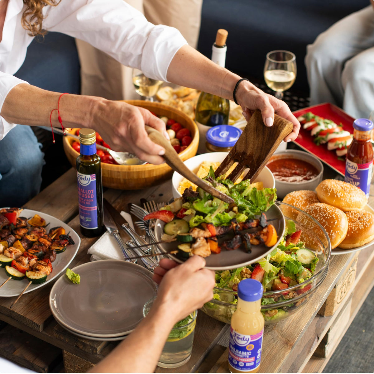Fody Steak Seasoning shaker with grill marks on a steak platter
