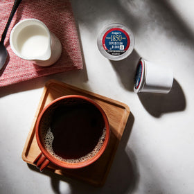 Folgers 1850 Expedition Blend K-Cups hero-pack on shelf for busy days.