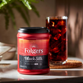 Folgers Black Silk Dark Roast cold brew setup highlighting smooth, low-acid flavor