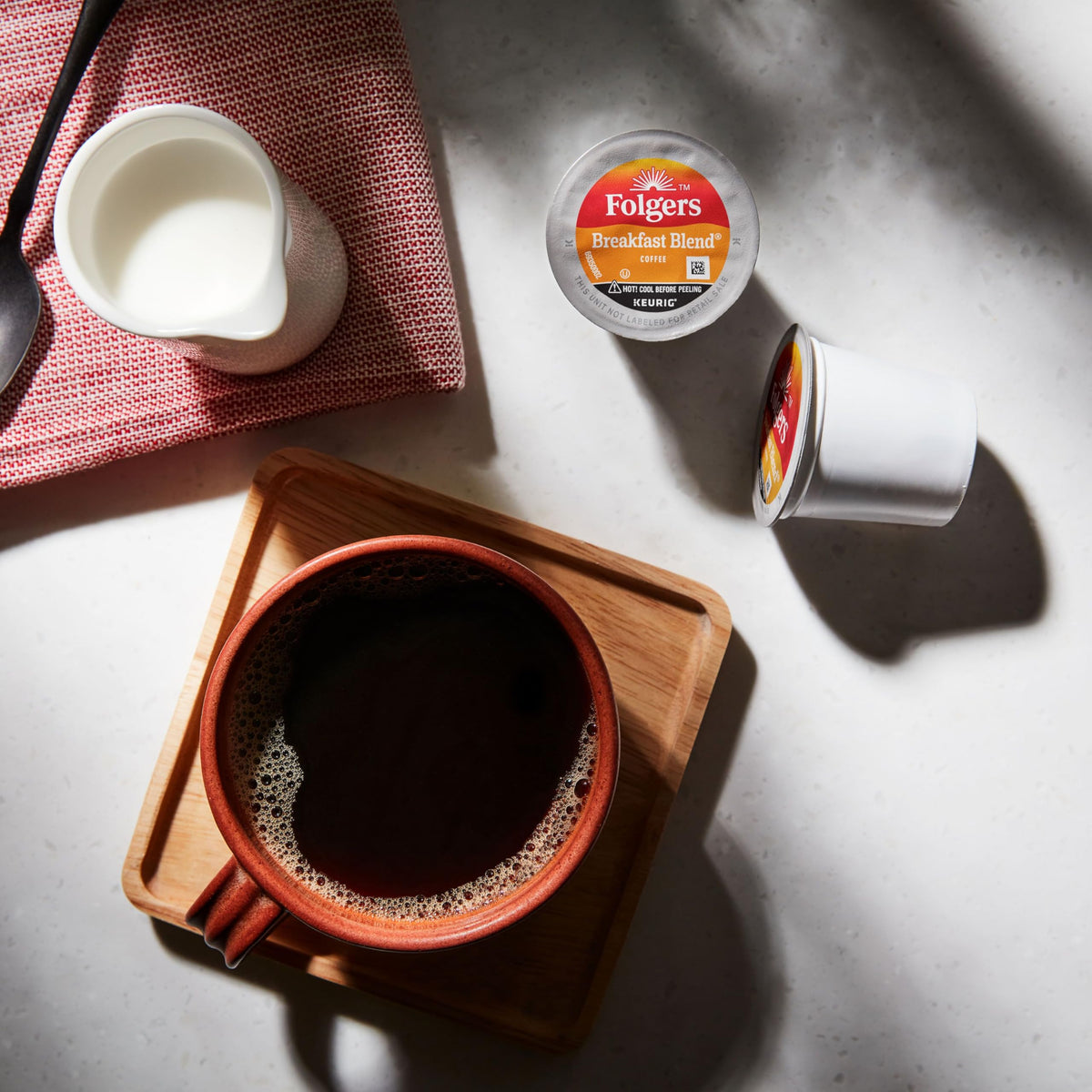 Folgers Breakfast Blend K-Cup brew in a mug for a quick morning cup