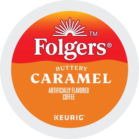 Folgers Caramel Drizzle K-Cups being inserted into a Keurig for quick brew.