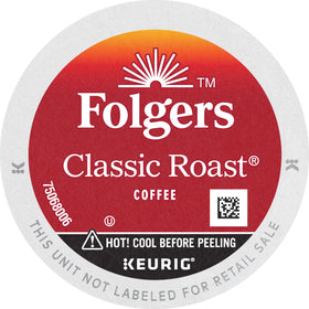 Folgers Classic Roast coffee pouring into a steaming cup with smooth flavor.