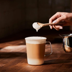 Finished cup of Folgers Classic Roast with smooth, balanced finish