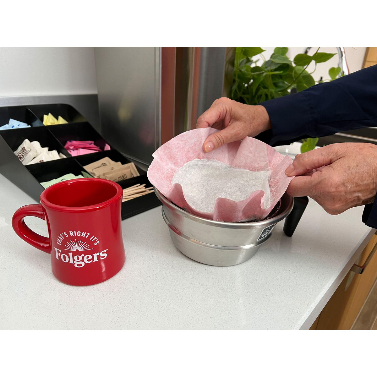 Folgers Classic Roast filter packs in brew basket deliver consistent flavor.