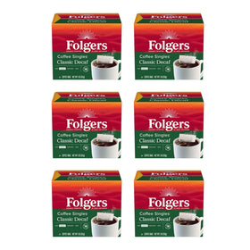 Folgers decaf coffee singles in six boxes for easy home brewing.