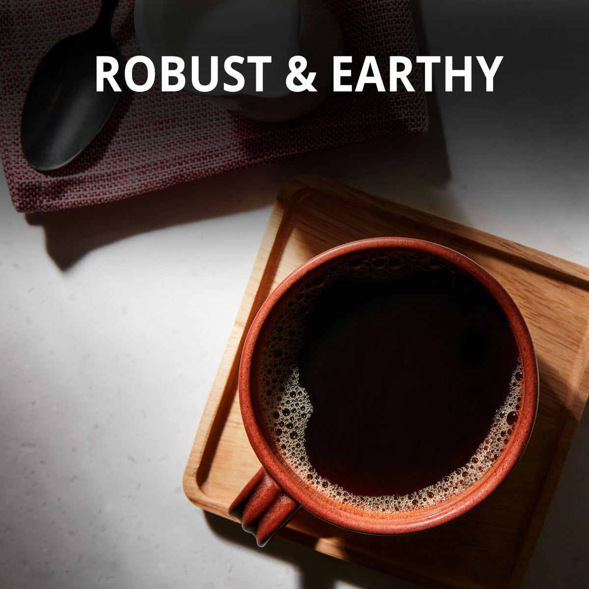 Folgers Coffeehouse Blend ground coffee packaging shows six-pack value.