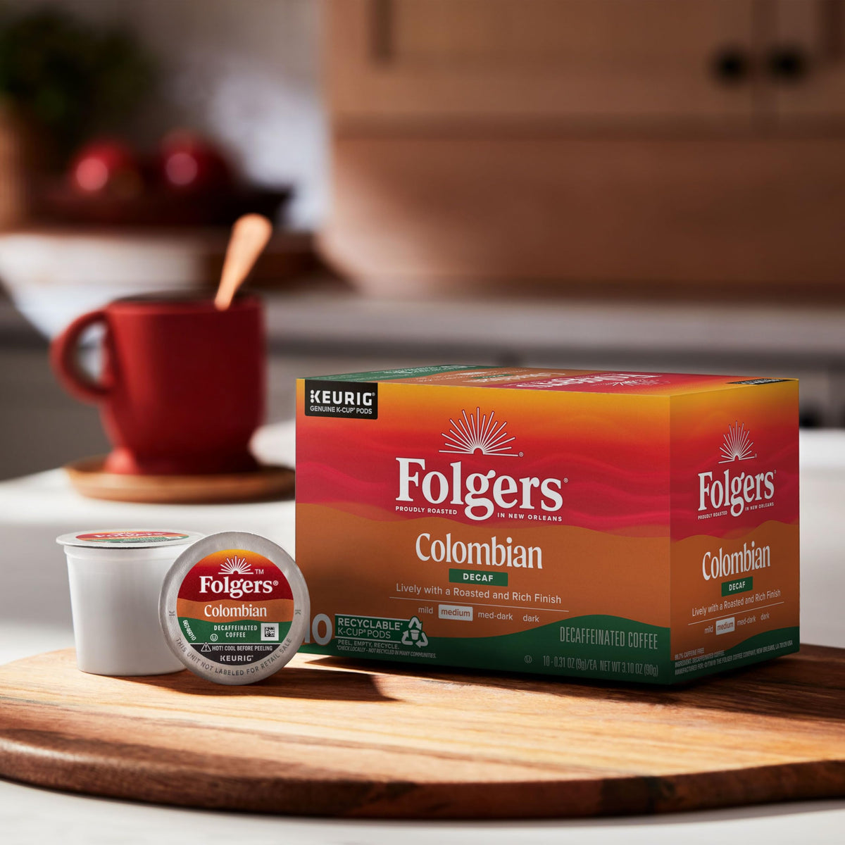 Folgers Colombian Decaf K-Cup packaging with recycling note for sustainability.