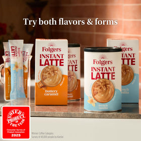 Folgers French Vanilla 16 oz canisters lined up in a pantry.