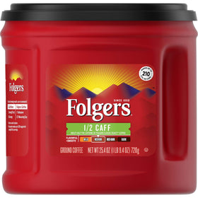 Folgers Half Caff coffee canister on kitchen shelf, ready for smooth mornings.