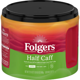 Folgers Half Caff ground coffee canister on counter preserves aroma and freshness.