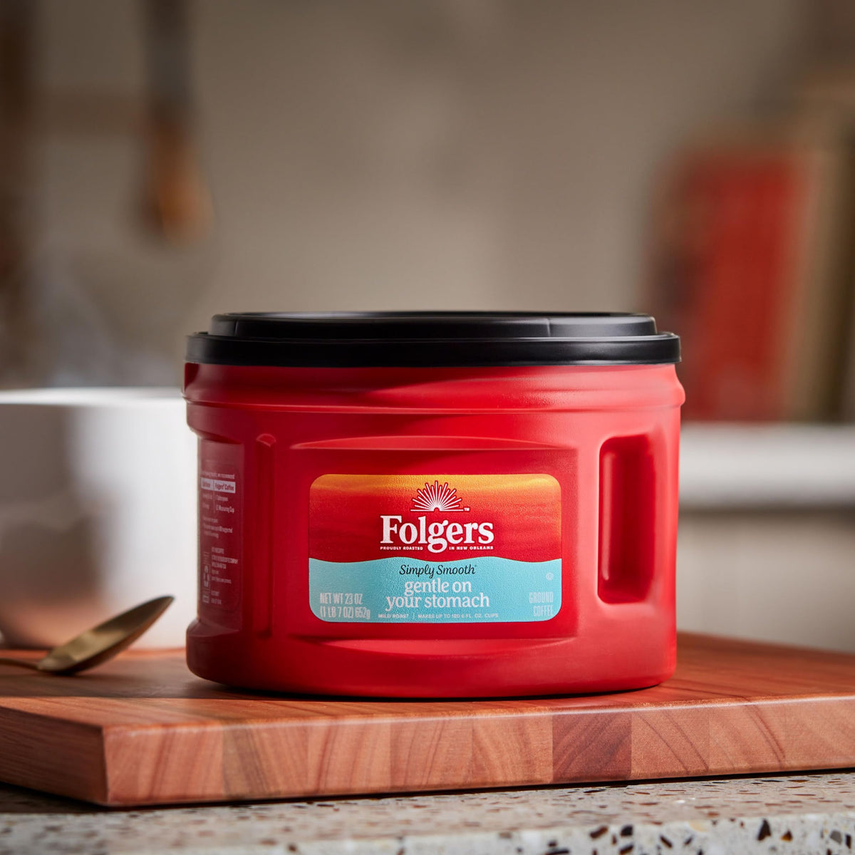 Folgers Simply Smooth aromaSeal lid closeup preserving freshness for flavorful brews.