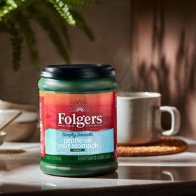Folgers Simply Smooth Decaf ground coffee ready for easy home brewing.