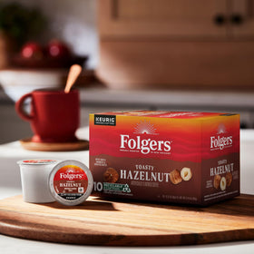 Folgers Toasty Hazelnut cup with creamer, showing customizable flavor for taste.