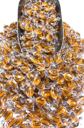 Unwrapped FolksField sugar-free butterscotch candies inviting a quick indulgent bite.