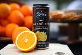Fonti Di Crodo Aranciata glass serve captures a chilled bubbly moment
