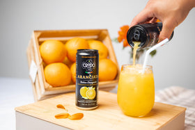 Fonti Di Crodo Aranciata orange-pulp closeup reveals real fruit pieces