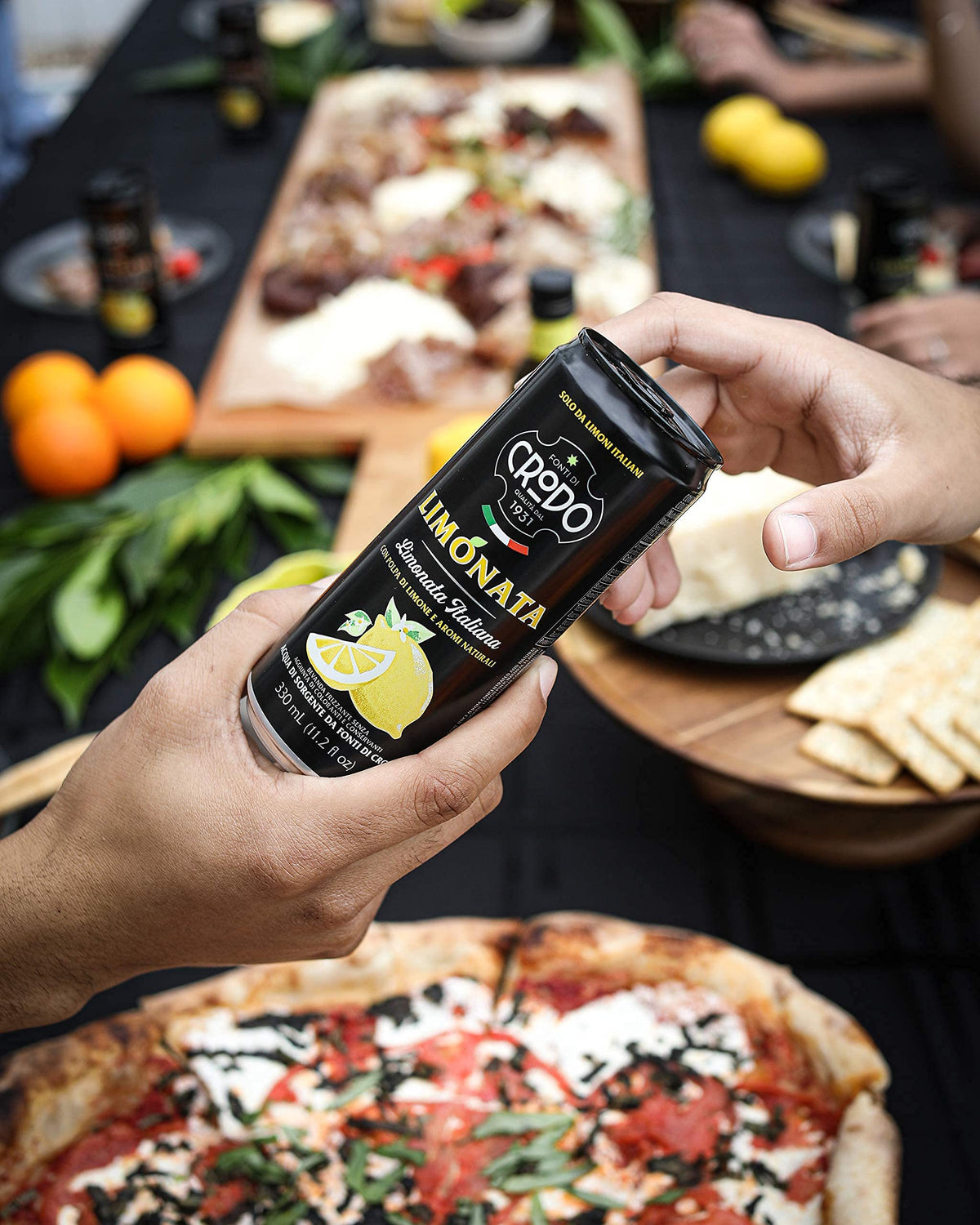 Fonti Di Crodo Limonata glass pour—bright bubbles and zesty aroma elevate summer moments.
