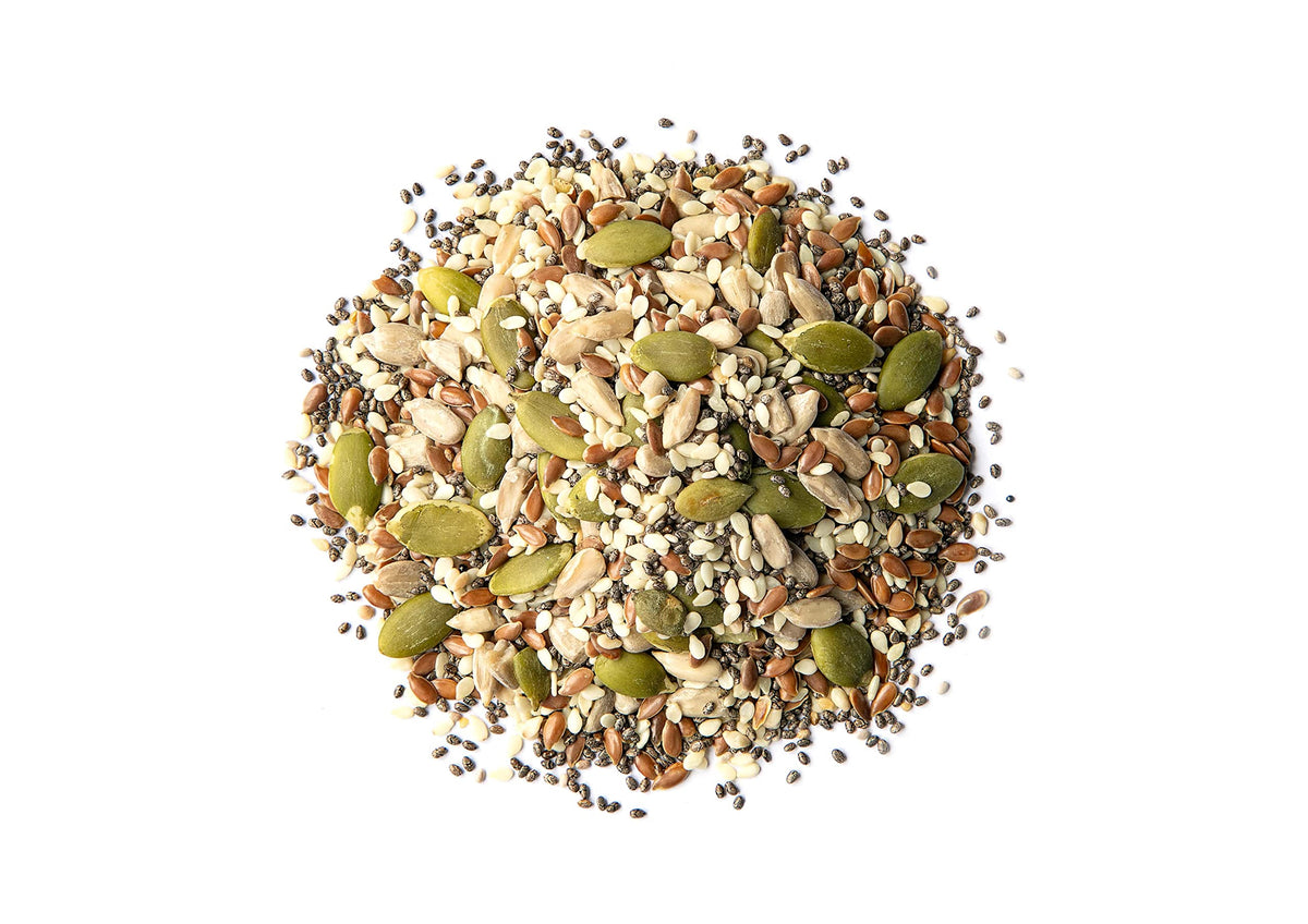 Food to Live mix sprinkled on oatmeal highlights crunchy texture and nutrient-dense start to day
