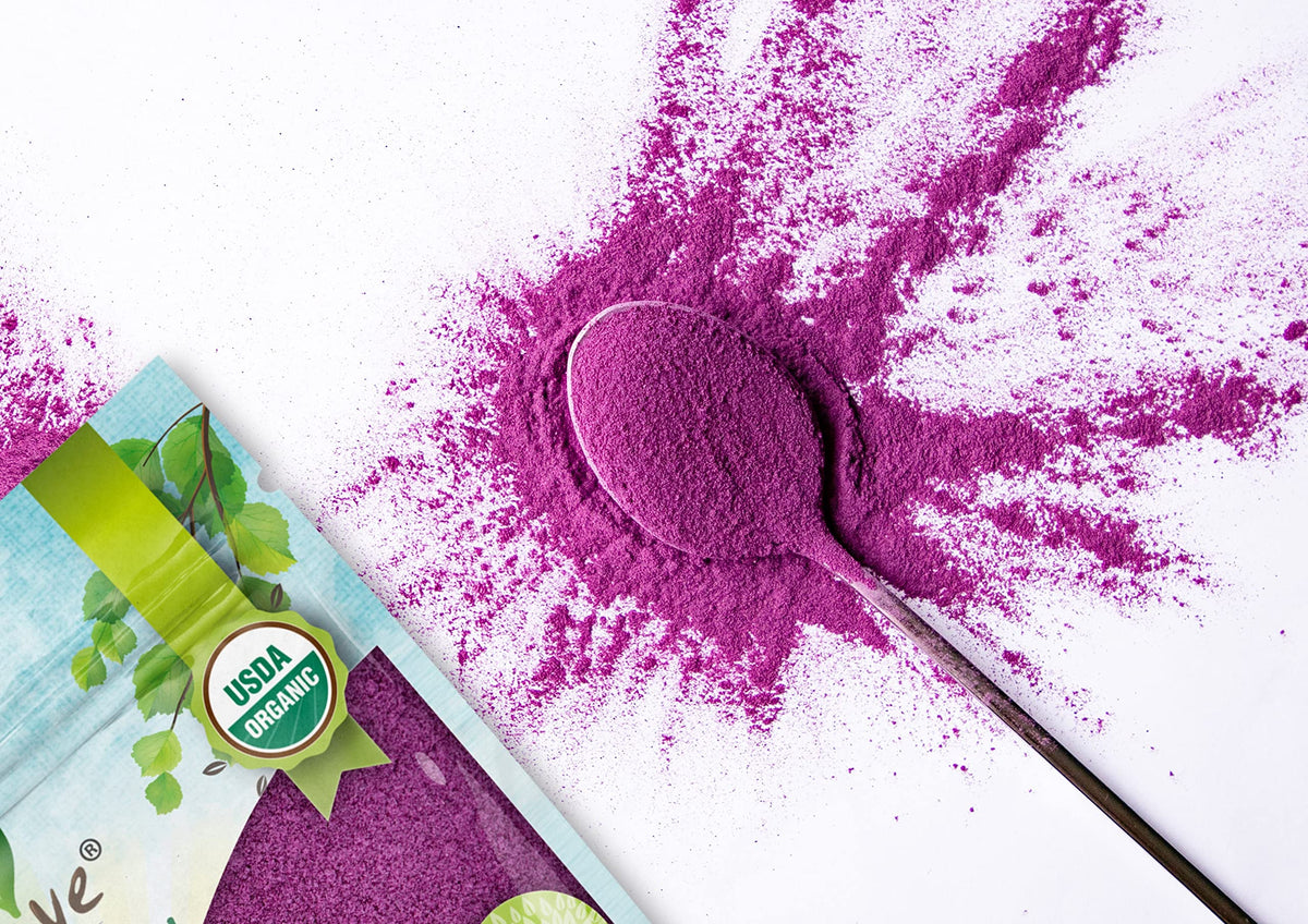 Food to Live purple sweet potato powder stirred into a smoothie for color