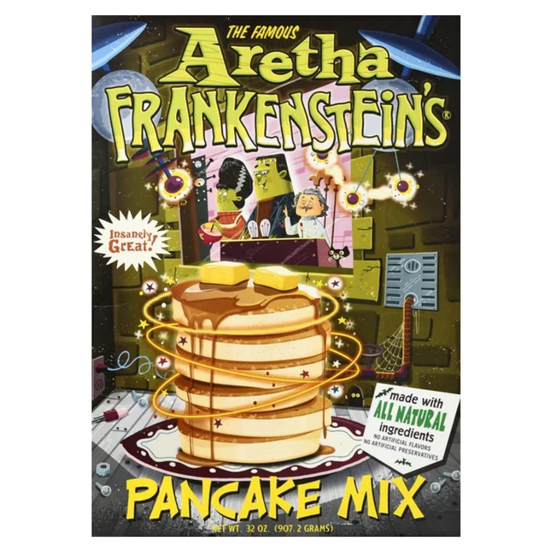 Pancakes cooking on a hot griddle using Aretha Frankenstein's mix.