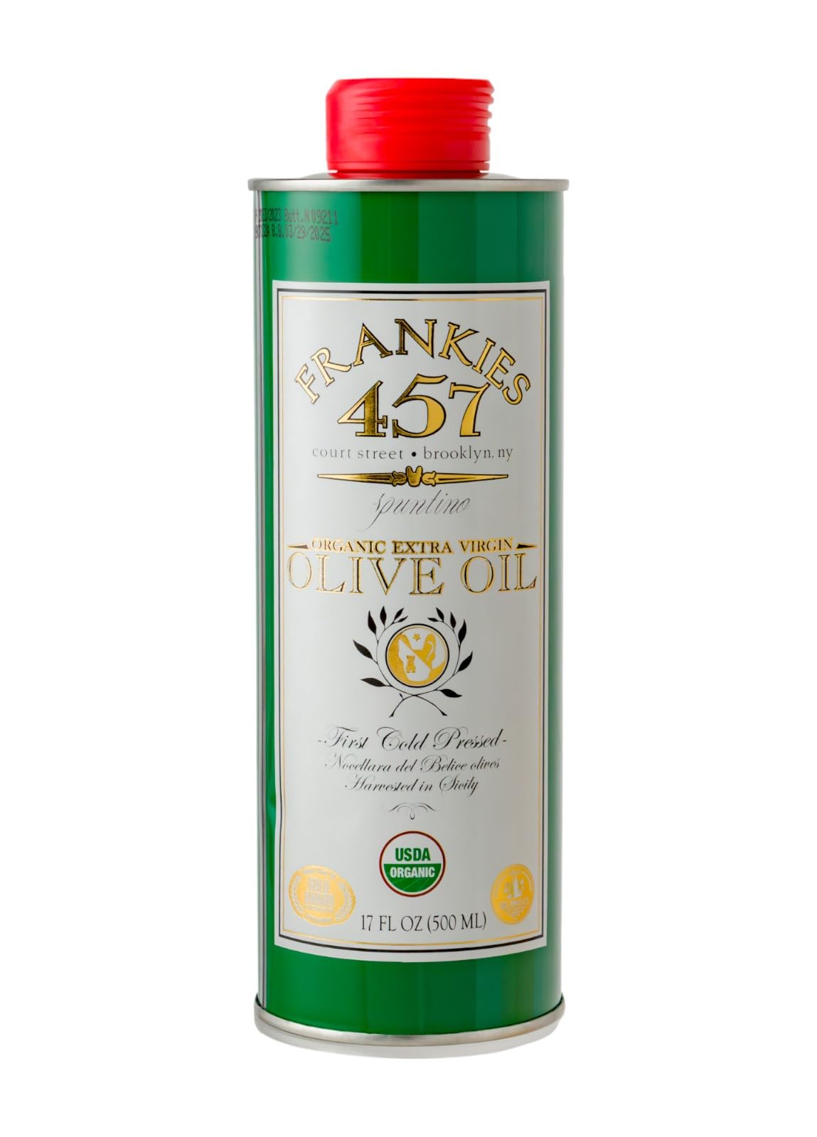 Frankies 457 Organic EVOO bottle pouring over vegetables to boost flavor.