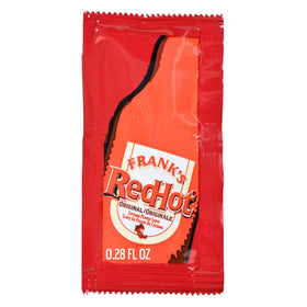 Close-up of a 7 g Frank's RedHot packet showing a precise single serving.