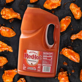Bottle on kitchen counter ready to flavor a dish with Frank's RedHot.