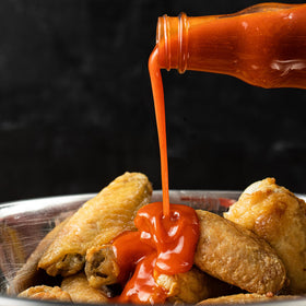 Frank's RedHot Original Cayenne Sauce on a sandwich for zesty kick