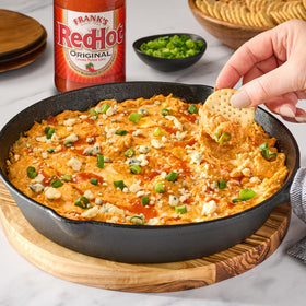 Wings tossed in Frank's RedHot Original Cayenne Sauce for bold heat