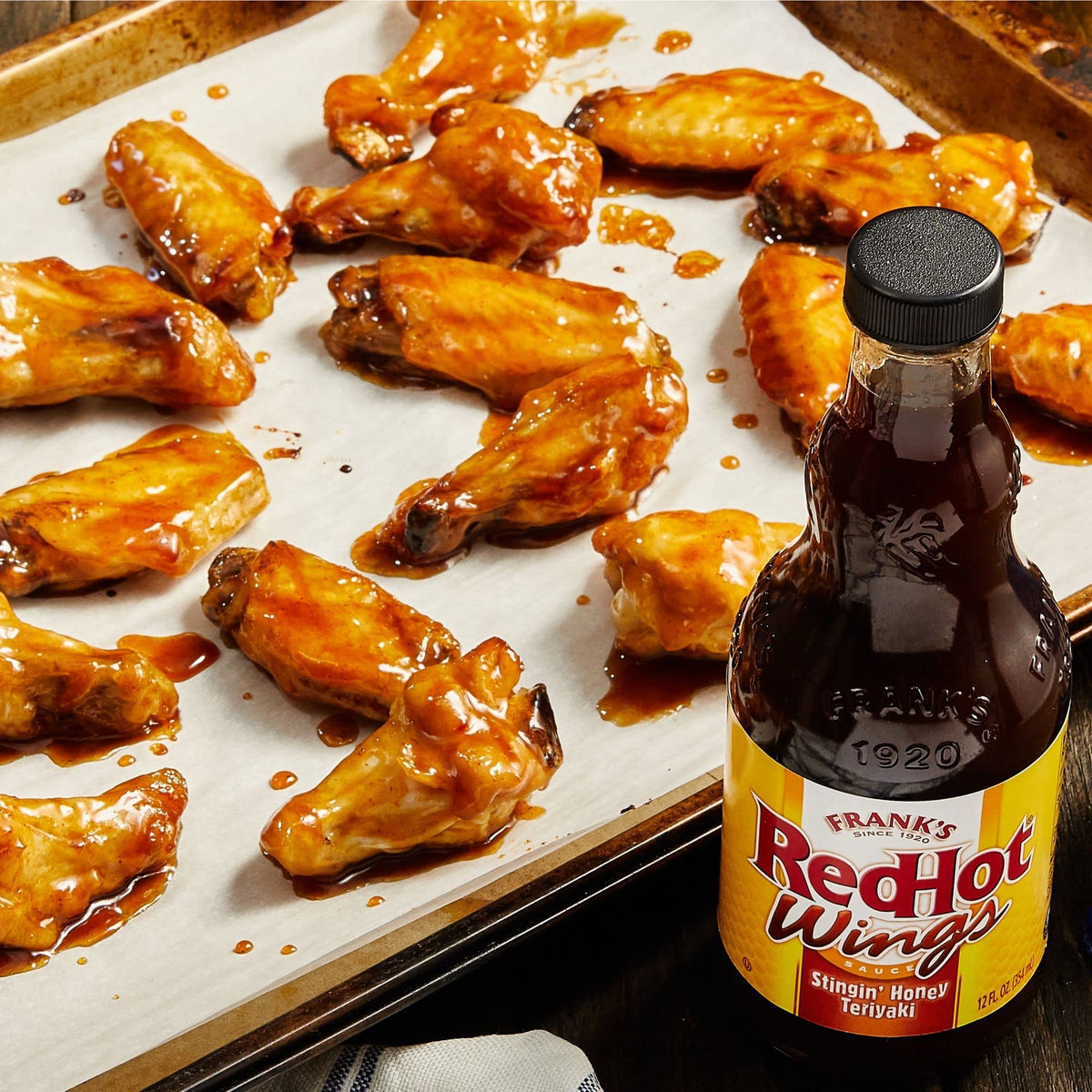 Frank's RedHot Stingin' Honey Teriyaki Wings Sauce on salmon adds kick