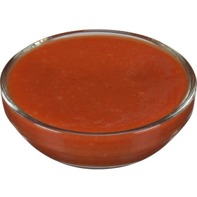 Frank's RedHot Xtra Hot 1gal-bulk-jug shown in a kitchen setting