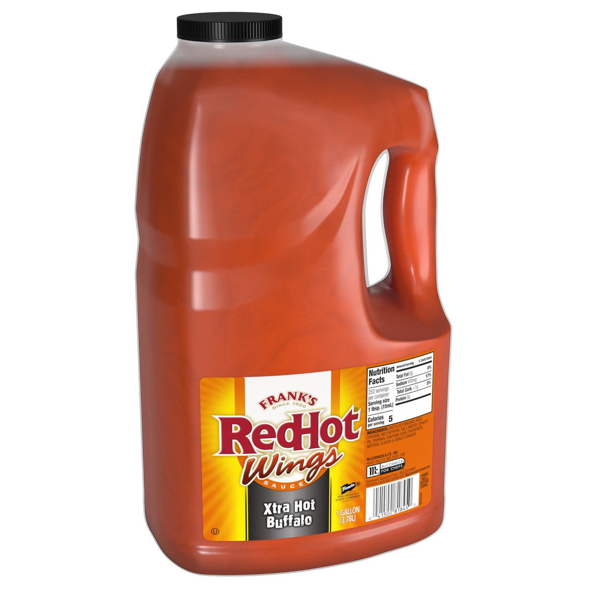 Frank's RedHot Xtra Hot Buffalo Wings Sauce bottle pour delivers bold flavor and intense heat.