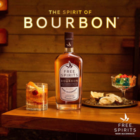 Free Spirits non-alcoholic bourbon spirit pour enabling precise strength control in cocktails.