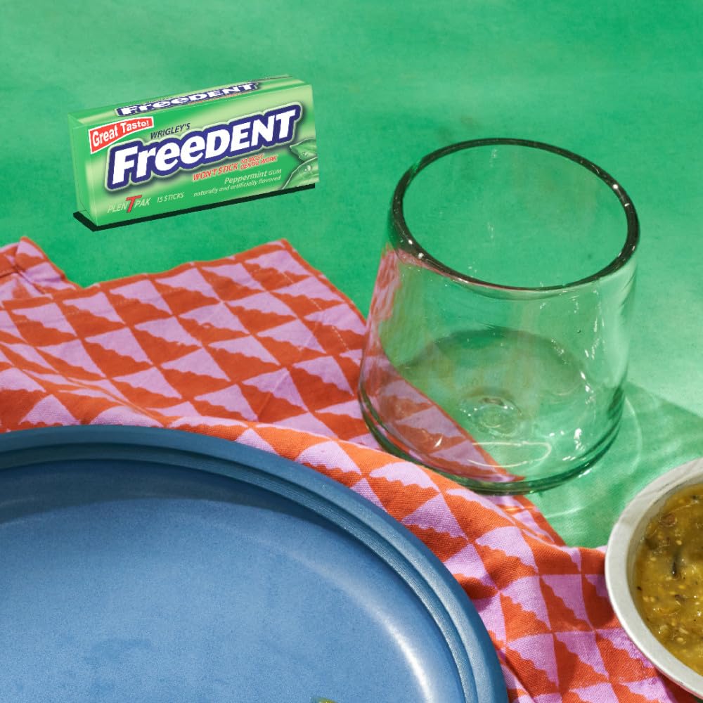 Twelve-pack display of Freedent gum for everyday use.