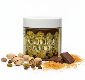 Freeze Munch Dubai Chocolate Jar with pistachio paste swirl for rich flavor on spoons.