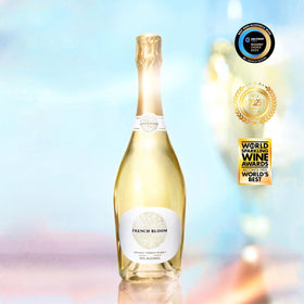 French Bloom Le Blanc being poured into a flute, ideal for festive toasts.