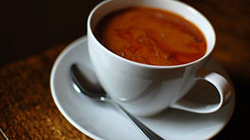 Pouring French Market Coffee & Chicory, delivering a rich New Orleans cafe vibe.